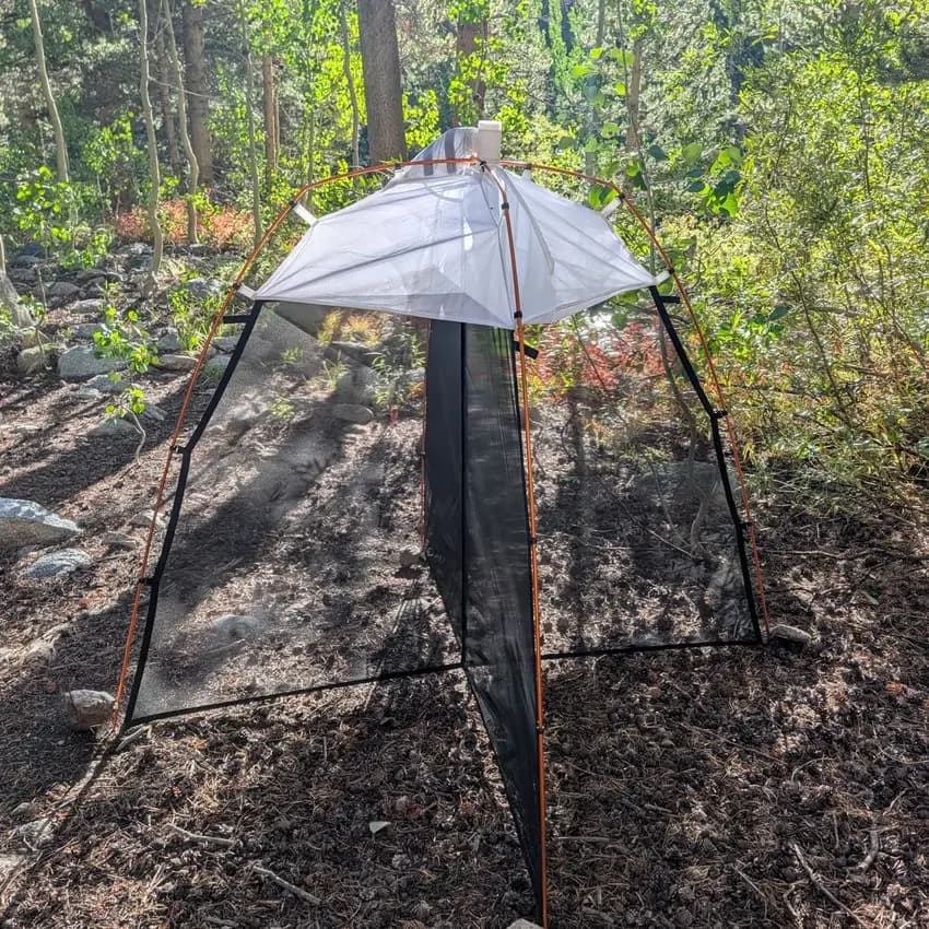 Malaise trap with collection bottle deployed in the field